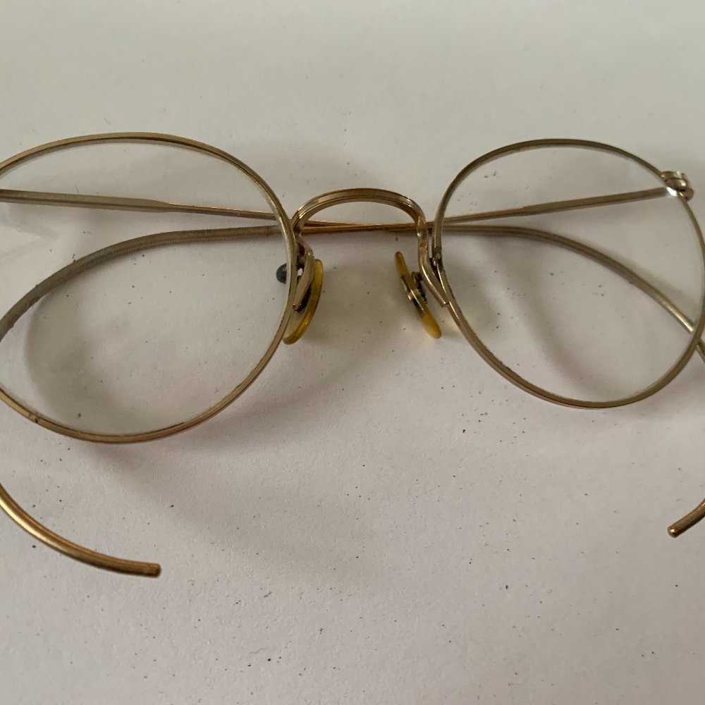 Gold-tone metal glass frames